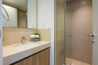 a bathroom with a sink and a shower at Luxurious 2BR in Downtown Views II, Zaabeel Second in Dubai