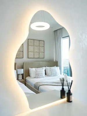 a hotel room with two beds and a window at Chic 4 Bedroom Apartment I Burj Khalifa & Fountain Views I Direct Access to Dubai Mall I Free Gym, Pool, Parking Wi-Fi and PS5 I by Skyline Serenity in Dubai