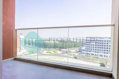 a large window in a building with a view of a city at Bloomfields Elegant Stu Jewelz in Dubai