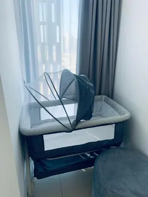 a bed in a room with a window at Iconic Sea View Marina - LUX NEW in Dubai