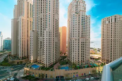 an aerial view of a city with tall buildings at 2BR Steps from JBR Beach in Dubai