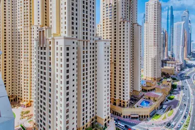 an aerial view of a city with tall buildings at ShoresInn - Stunning 1BR with Marina View in Dubai