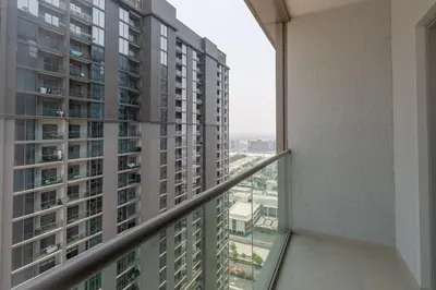 a view from the balcony of a building at Ahlan HH - Luxury 2BR in Sobha Creek Vistas in Dubai