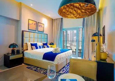 a bedroom with a large bed and a large window at NiceVisit Majestine Stuido Business bay in Dubai