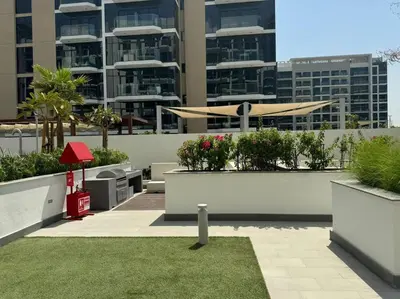 a view of a balcony of a building at Stunning Studio in Meydan Azizi 42 in Dubai