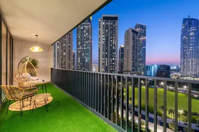 a balcony with a view of a city skyline at FIRST CLASS 2BR Stylish Bliss in Dubai