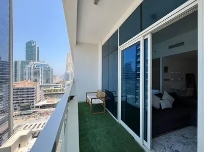 a balcony with a view of a city at Studio in Studio One Marina in Dubai