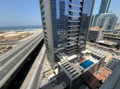 an overhead view of a building with a swimming pool at Studio in Studio One Marina in Dubai