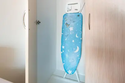 a door with a painting of a starry sky at Sunny Studio Perfect For Discovery Gardens Stays in Dubai