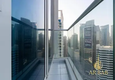 a view of a city skyline from an office window at Damac Maison Prive - Luxury Studio - Burj Khalifa View in Dubai