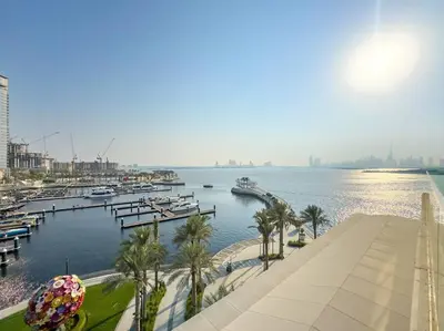 a view of a marina with boats in the water at FIRST CLASS 1BR Urban Chic Oasis in Dubai