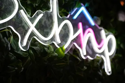 a close up of a neon sign that says msg at Atelier Partition Room in Tecom Near Internet City Metro in Dubai