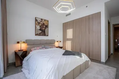 a bedroom with a large bed in a room at Top-Notch 3BR in Stella Maris Tower in Dubai Marina in Dubai