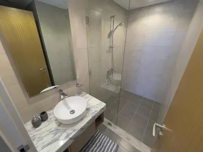 a bathroom with a sink and a shower at 2 bedroom in Downtown Dubai in Dubai