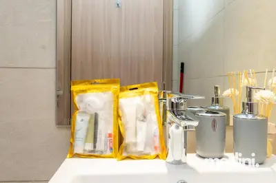 a counter with two bags of items on it at Cozy Studio in Azizi Riviera - Dubai in Dubai
