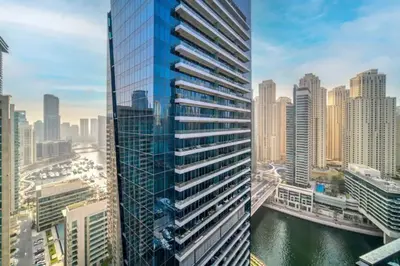 a view of a tall building in a city at Bright & Serene Flat in the Marina, by Only Stays in Dubai