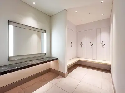 a dressing room with a large mirror on the wall at The Address Residences Dubai Opera, Full Burj Khalifa View, 2BR Downtown Luxury in Dubai