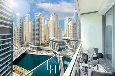 a balcony with a view of a city at LUX The Silverene Marina View Studio 1 in Dubai