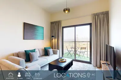 a living room with a couch and a table at Locations I Binghatti Gate I Premium Modern 2BR I Skyline & Community Views I Spacious & Comfortable Stay in Dubai