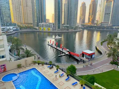 a view of a river in a city with tall buildings at Livincci - Luxury Studio in Dubai Marina - 15 in Dubai