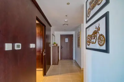 a hallway with a hallway at Cozy 1-Bedroom Apartment at Heart of Dubai in Dubai
