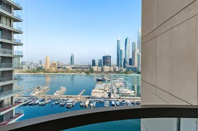 a view of a marina with boats in the water at Seaside Lux Retreat 2-BR Private Beach in Dubai