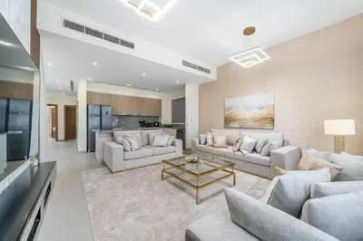 a large living room with couches and a table at NewArabian Sidra1 -4 BR & Maid in Dubai