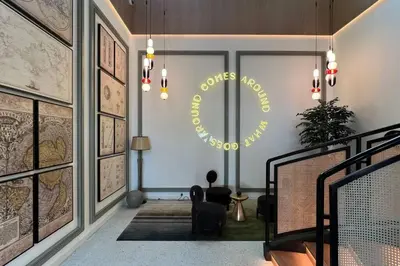 a lobby with a sign that says good spirits are always welcome at Cozy 1 - Bedroom Retreat in DHE in Dubai