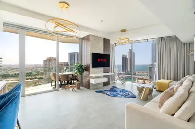 a living room with a view of the city at Deluxe Marina View 2BR - Stella Maris Retreat in Dubai