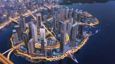 an overhead view of a large city at night at Palace Residence Dubai Creek Harbour 1 Bd Apt in Dubai