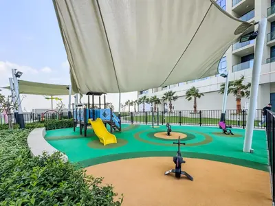 a playground in a building with a slide at Stylish 1-Bedroom in Prime Business Bay Aykon C in Dubai