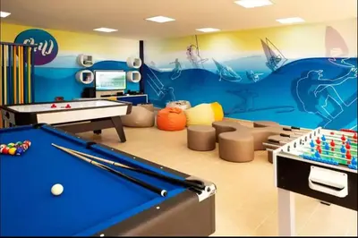 a childrens play room with a pool table and balls at AWS Holiday Homes - Tranquil Stay at the Palm in Dubai