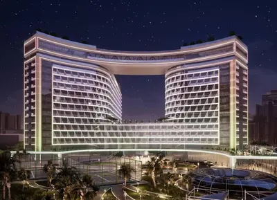 a rendering of a large building at night at Luxurious Studio In Seven Palm Hotel & Apartments in Dubai