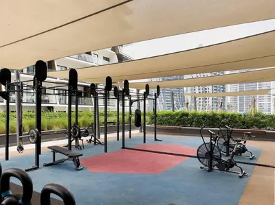 a gym with cardio equipment in a building at Rare Luxury 1bdr 15 Northside in Dubai