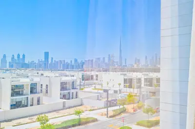 a view of the city from a building at 1BR Retreat by the Crystal Lagoon in District One Meydan in Dubai