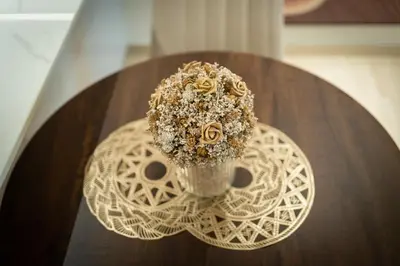 a table with a cup of food on top of it at Chic Comfort - Stylish One-Bedroom in Dubai