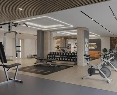 a gym with several exercise equipment in a room at Nasma Luxury Stays - Trendy & Stylish Living Studio at Azizi Riviera 41 in Dubai
