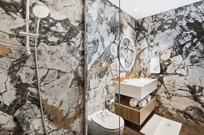 a bathroom with a shower and a sink at Modern Apartment in Dubai Creek Harbour By DuStay in Dubai