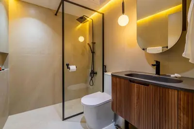 a bathroom with a toilet and a sink and a shower at GuestReady - Splendid Stay in Dubai Marina in Dubai