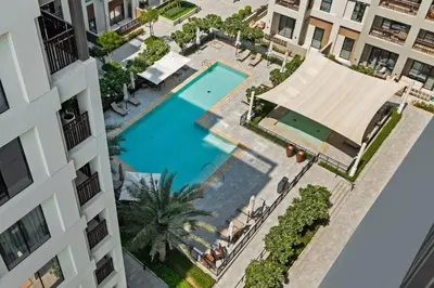 an overhead view of a swimming pool in a building at Breathtaking Dubai Skyline view apartment - By DuStay in Dubai