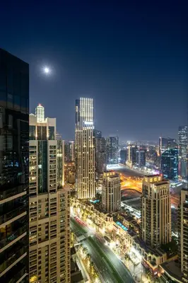 a view of a city at night with traffic at Peaceful Dunes 2 - Near Burj Khalifa & Dubai Mall in Dubai