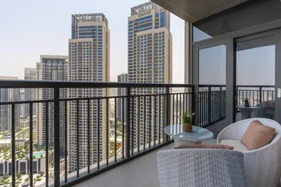 a balcony with a view of a city skyline at Skyline Huge 1 Bedroom Apartment Creek in Dubai