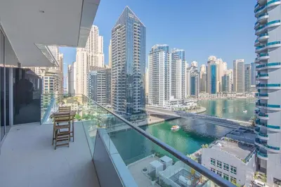 a balcony with a view of a large city at Stella Maris, Dubai Marina- Luxurious 1-BR in Dubai