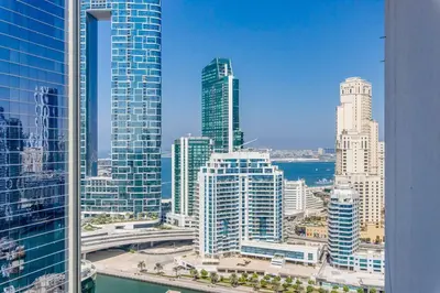 a view of a city skyline with tall buildings at Knokey Dubai Marina Comfortable Apartments with Pool and Gym in Dubai