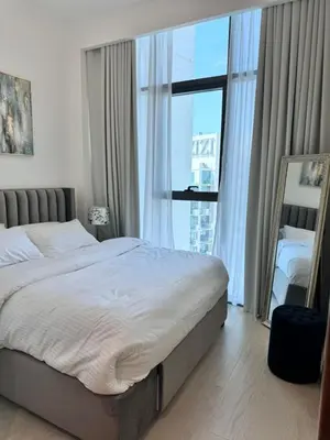 a bedroom with a large bed and a large window at Burj Khalifa view modern 1BHK with balcony in Dubai