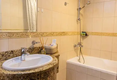 a bathroom with a sink and a bath tub at Lux two br w Sea Views from rooms in Dubai Marina in Dubai
