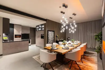 a dining room and kitchen with a table and chairs at Address JBR, Beach View, Jumeirah Beach Residence - Mint Stay in Dubai