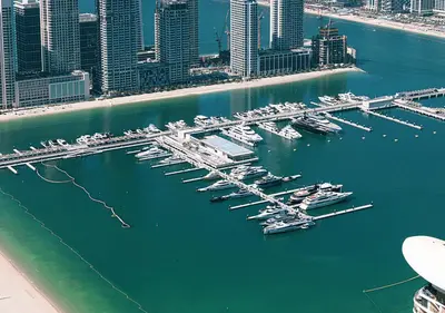 a group of boats docked in a marina in a city at Princess Tower - Spectacular Sky Views, Palm Jumeirah & JBR Beach in Dubai
