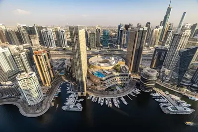 an aerial view of a city with tall buildings at Dubai Marina 3BR Penthouse with Stunning JBR, Marina & Dubai Eye Views in Dubai
