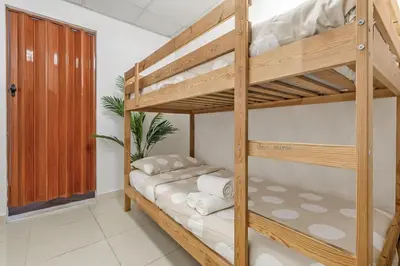 a room with two bunk beds with white towels at Elegant 3BR Lux Stay in the Heart of Dubai Marina in Dubai